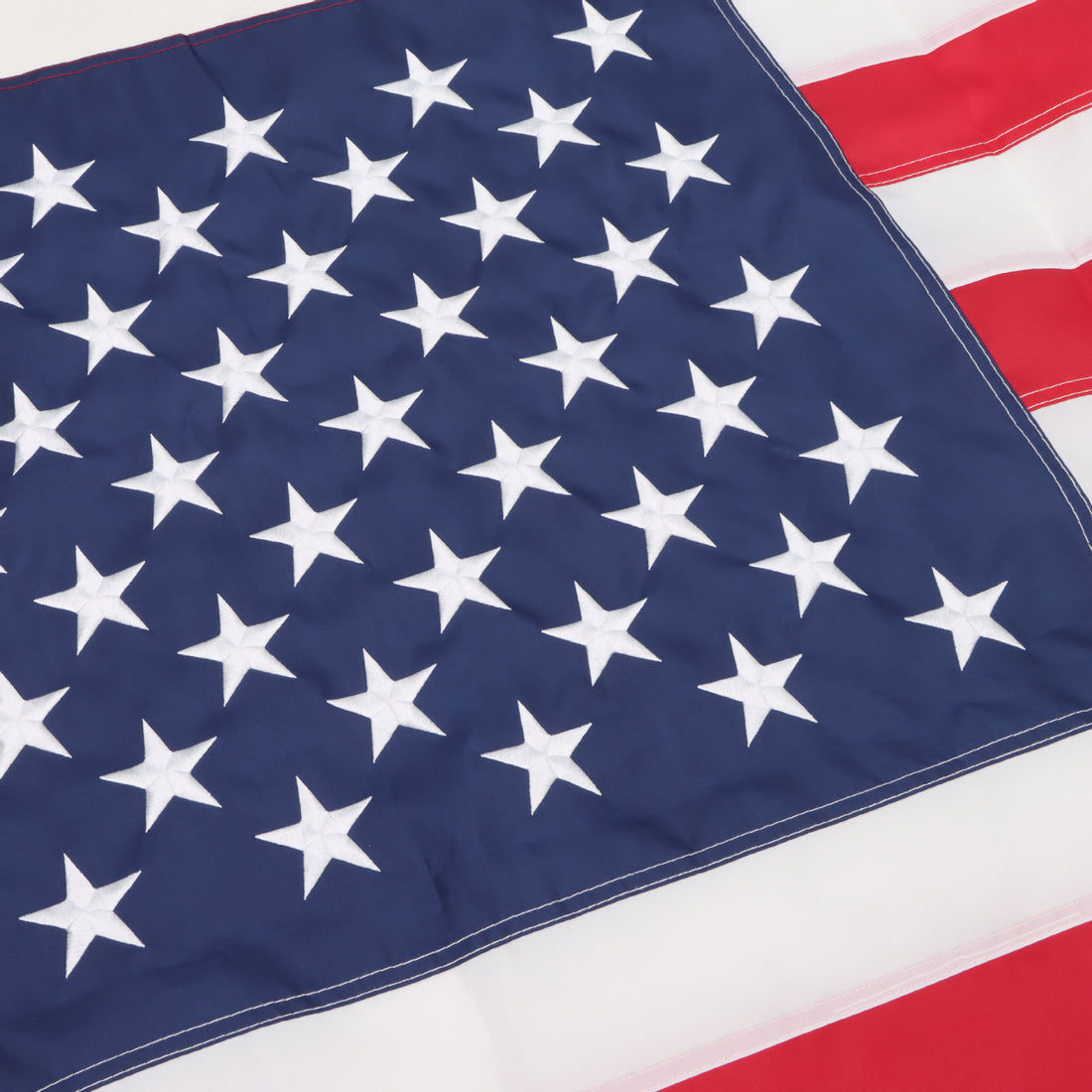 Close-up embroidered stars on American flag fabric