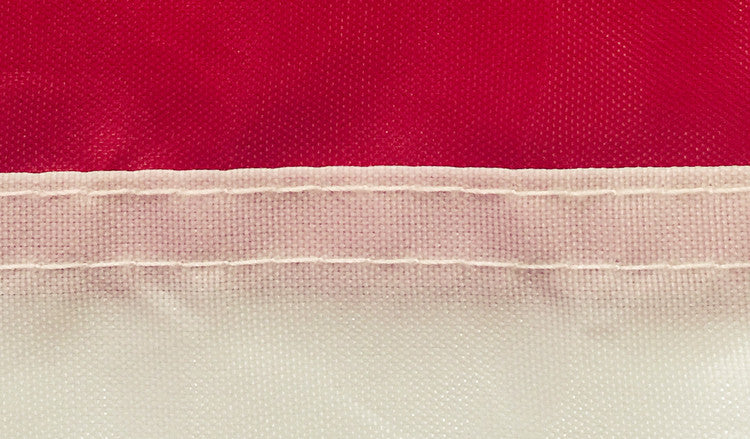 Close-up stitched flag seam detail